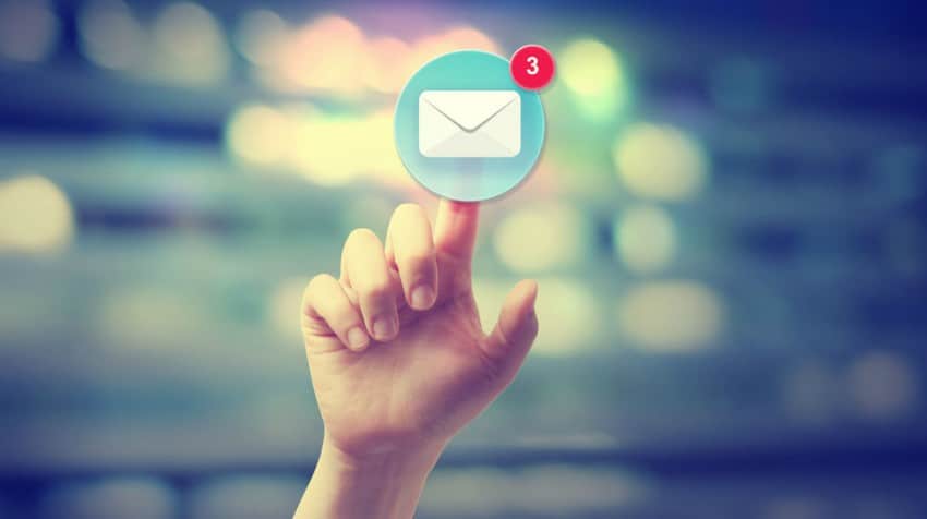 Email Icon being pressed by a hand