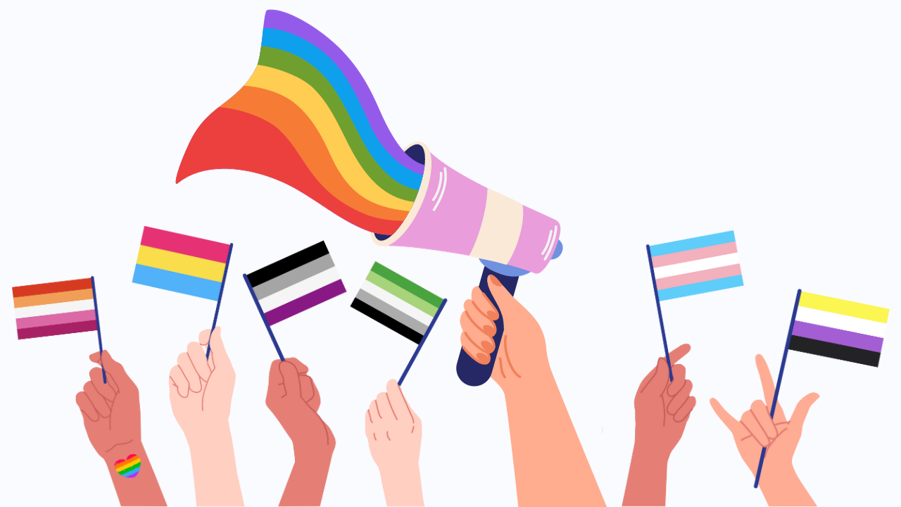 Hands holding up different LGBTQ+ flags.